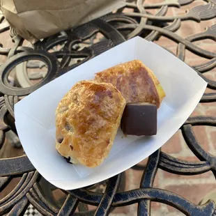 Blueberry pastry, custard pastry, small gingerbread chocolate covered delicious thing.