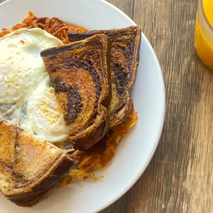 Rosti.  Hash browns stuffed with Gruyere cheese, bacon, and onions