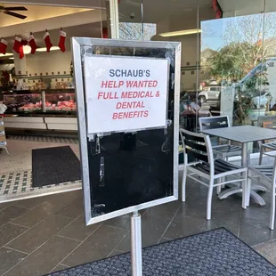 a sign in front of a store