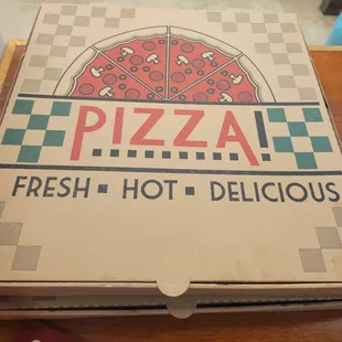 a pizza box on a table