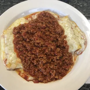 Baked Manicotti with meat sauce.