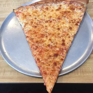 1 huge slice and a drink only $4.39 these slices look like 2 slices together!! We love coming here!!!