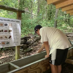 My cousin mining for rocks