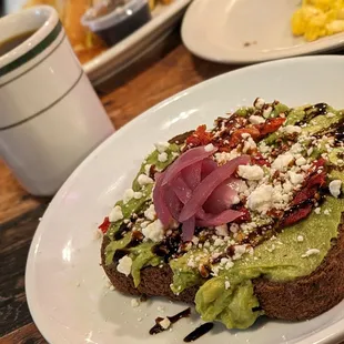 Avocado toast with feta and pickled onion
