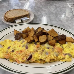 Their lox and onion omelet. It looks good, is too dry, and is nearly tasteless.