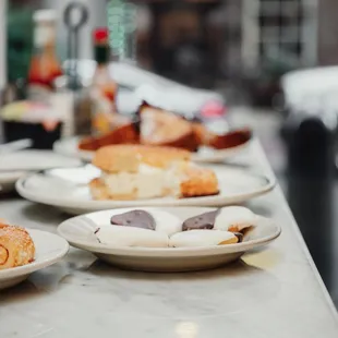 plates of pastries on a table