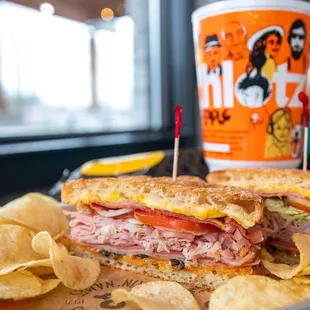 a ham sandwich and chips