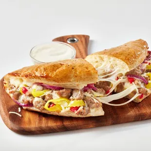 a sub sandwich on a cutting board