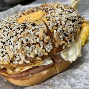 Everything bagel with cheddar garlic cream cheese, pork roll and egg