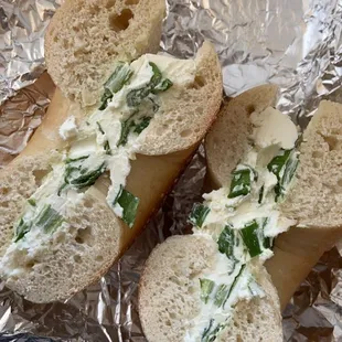 scallion cream cheese on plain bagel