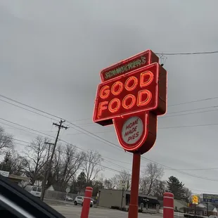 a neon sign for a restaurant