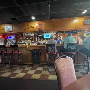 people sitting at the bar