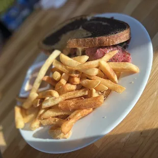 a plate of fries and a sandwich