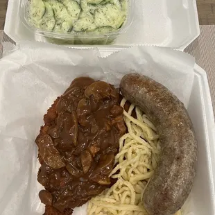 Jägerschnitzel with Spätzle and bratwurst with cucumber salad