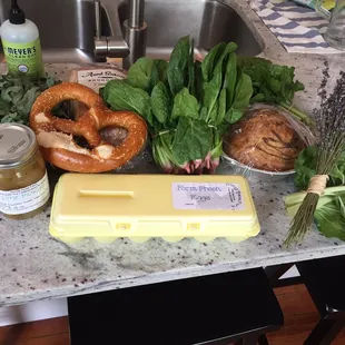Here is our haul from opening day. Not pictured: Finn's Biscuits (in our bellies). (PS the soap just photobombed.)