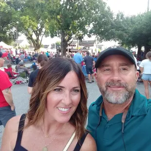 a man and woman taking a selfie