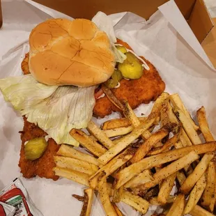 Midwest Sandwich...those aren't pickles on top of excess breading, that's part of the pork tenderloin!