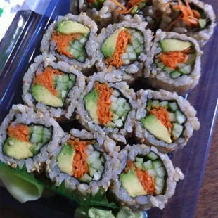 a tray of sushi rolls