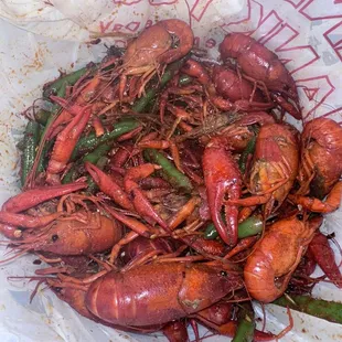 Dry crawfish served in a plastic dump bag....