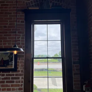 Window with books above it