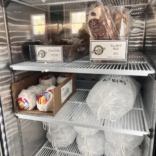 the inside of a refrigerator filled with food