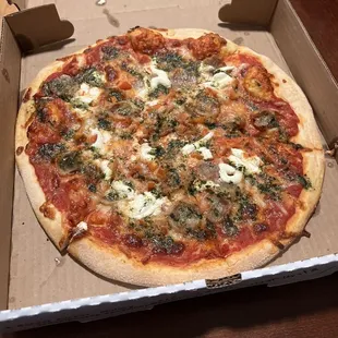 Sausage, mozz, pesto and Roma tomato pizza!