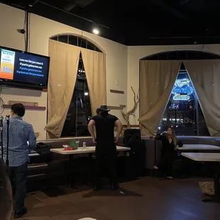 a group of people watching television