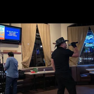 a man holding a baseball bat