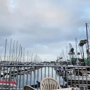 sailboats docked at a marina