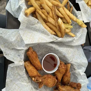 Chicken wings and fries