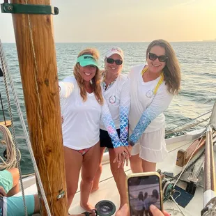 The ladies sporting team colors on the birthday sail
