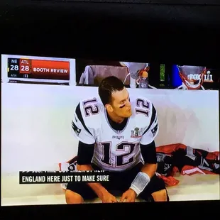 a football player sitting on the bench