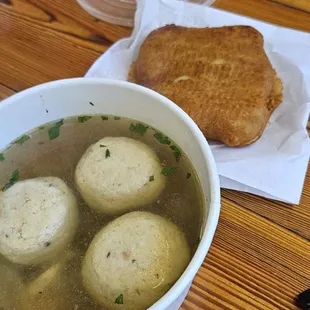a bowl of soup and bread