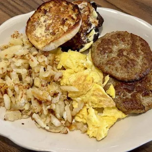 American fries, scrambled eggs, sausage patties, toasted to perfection English muffin.
