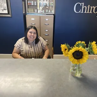 Our receptionist Kayla, ready to help you.