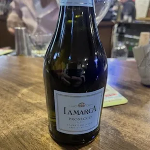 a bottle of wine on a table