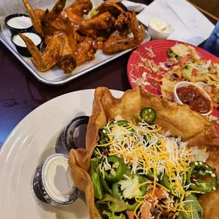 Chicken nachos, Buffalo wings and a taco salad (loved the jalapeños!)