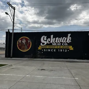 a sign for schwab meat