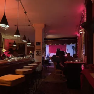 people sitting at the bar