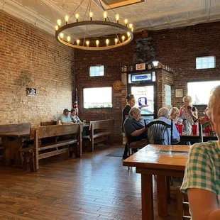 a woman sitting at a table