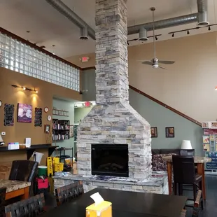 a fireplace in a coffee shop