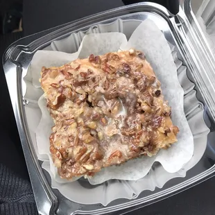 Gluten free apple cinnamon coffee cake smothered in Carmel and pecans. Heaven in a box. Delicious option for a sugar coma.