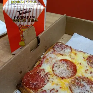 Sicilian slice w an iced tea.