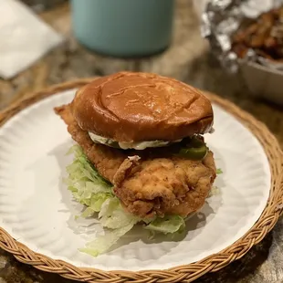 a chicken sandwich on a plate