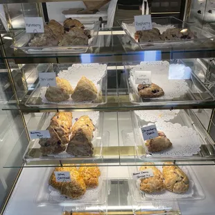 a display case filled with baked goods