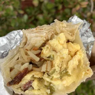 Breakfast burrito with bacon and hash browns