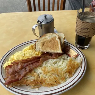 Egg breakfast with meat and an americano