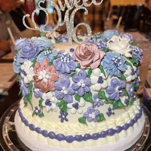 a wedding cake with flowers