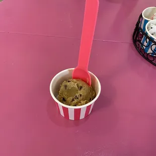 A single scoop of Chocolate Chip Cookie Dough