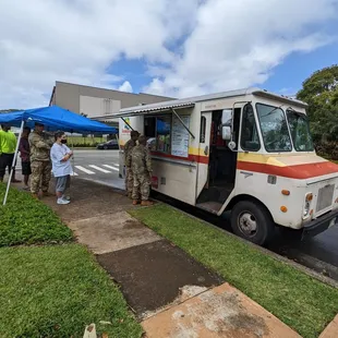 a group of people standing outside